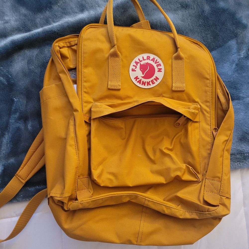 Yellow Fjallraven Kanken backpack